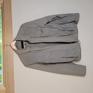 Calvin Klein Jeans Jacket. Silver color. Size small. Never worn.